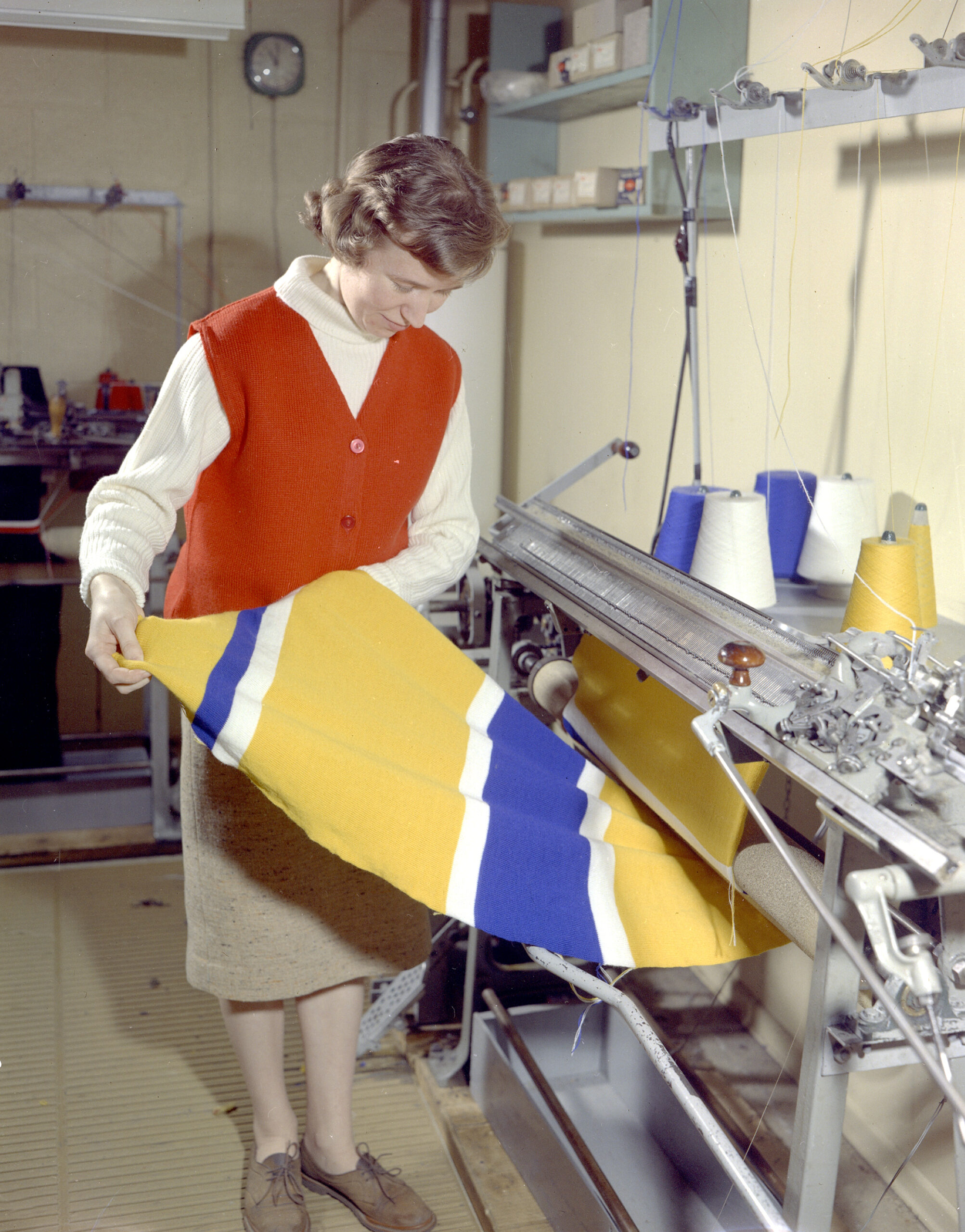 Knitting mill factory interior showing garment manufacturing equipment and fabric production MOQ negotiation