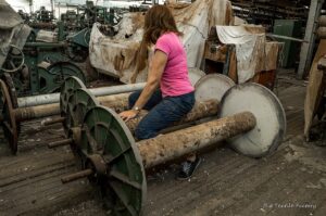 Large textile factory floor showing production machinery and manufacturing operations