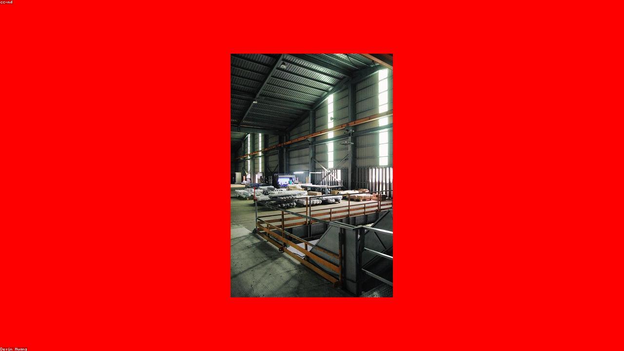 Rolls of fabric stored in a textile warehouse ready for streetwear garment production