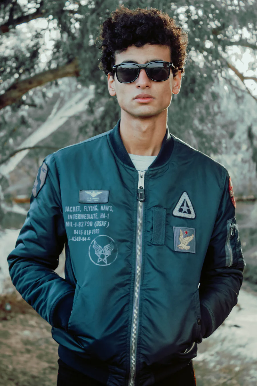 Close-up of ribbed collar and front zipper closure on a bomber jacket manufacturer sample