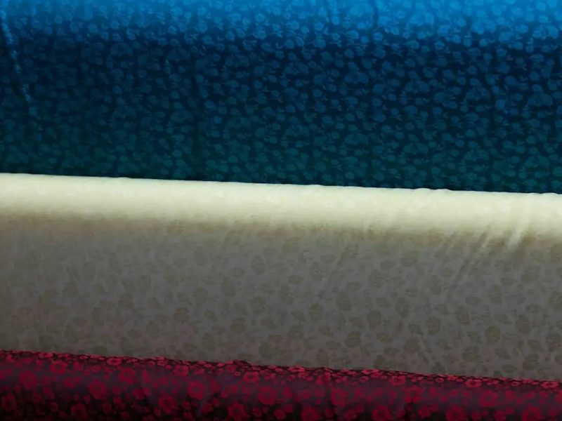 Rolls of printed fabric in multiple colorways for apparel fabric sourcing