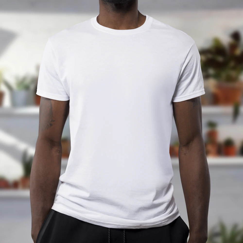 Model wearing a plain white fit sample t-shirt during a garment sampling fit review
