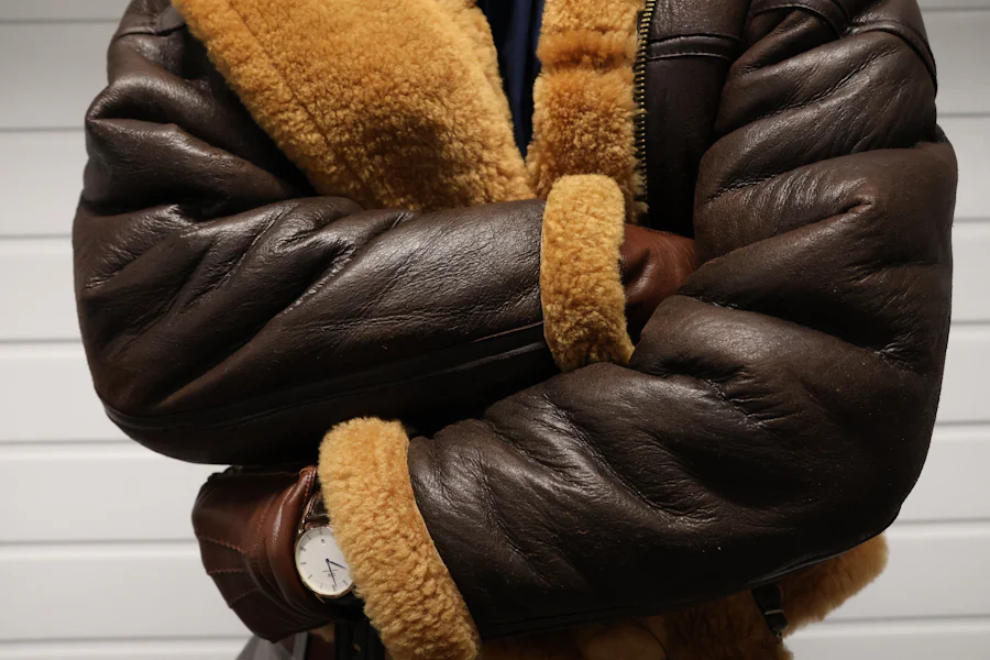 Close-up of leather jacket stitching and construction detail from a leather goods manufacturer