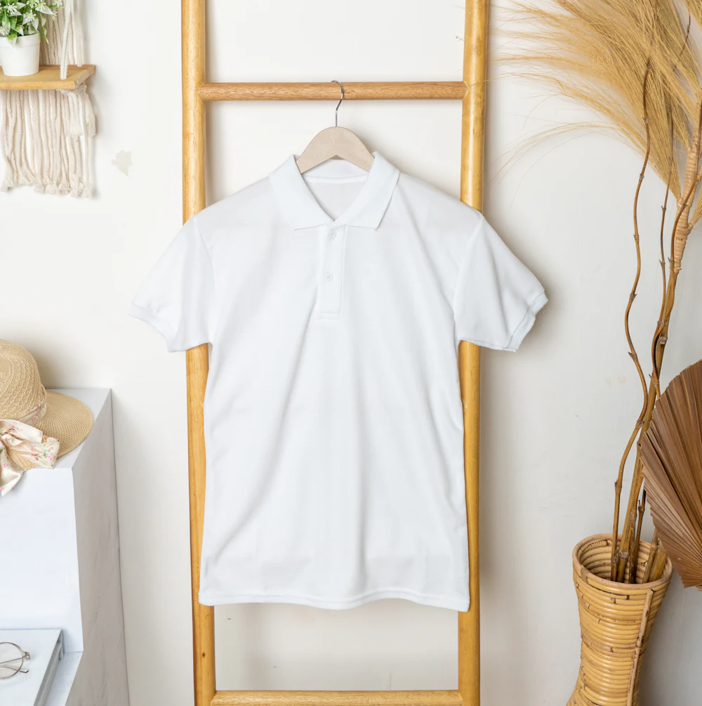 Polo shirt manufacturer white pique sample hanging with collar and button placket