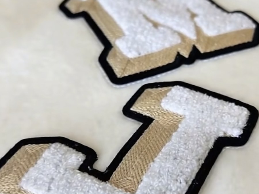 Chenille varsity letter patches produced for school uniform and spirit wear orders