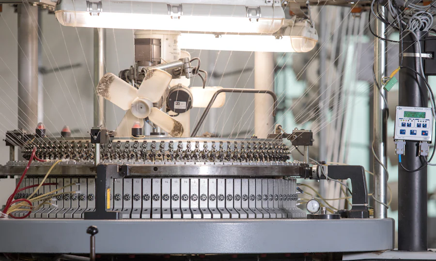 Circular knitting machine used to produce seamless underwear in one continuous knit tube
