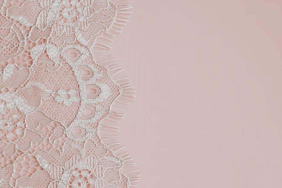 Close-up of scalloped lace fabric used for bralette panel construction