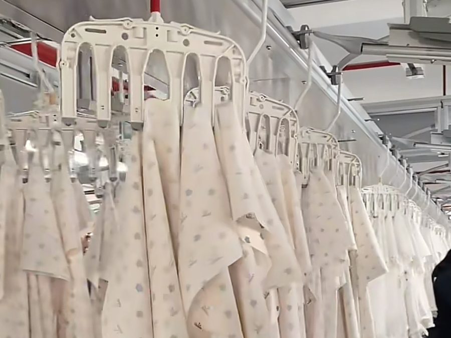 Rail of a completed 50-piece style run at PRP Apparel's clothing manufacturing factory