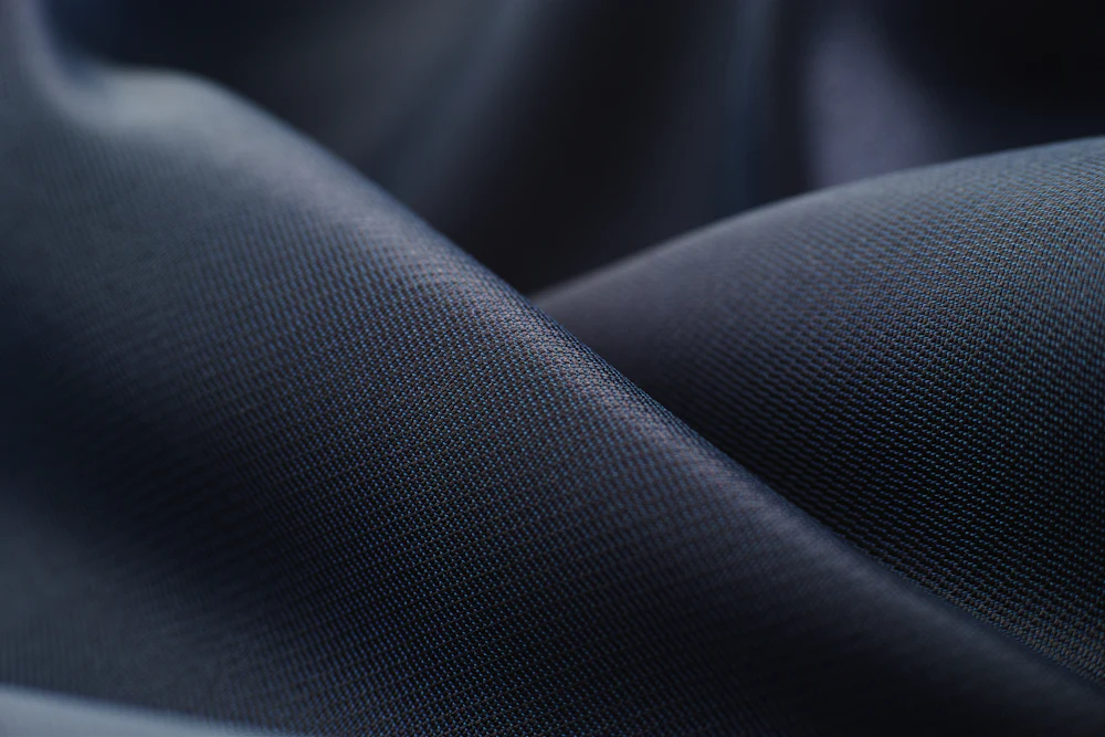Detail shot of woven waistband fabric texture used in yoga pants construction